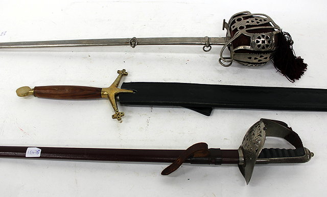 Appraisal: A TH CENTURY REPRODUCTION SCOTTISH OFFICERS SWORD with basket hilt