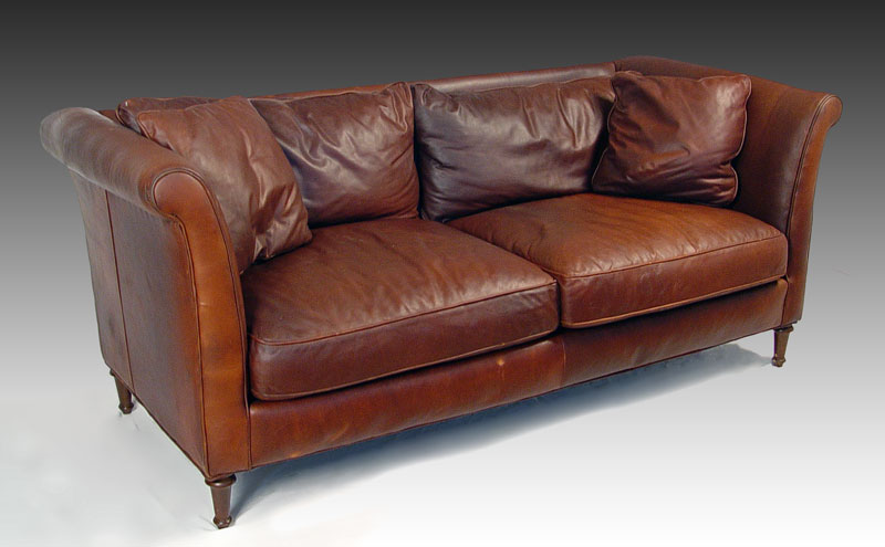 Appraisal: BROWN LEATHER SOFA Contemporary leather sofa retailed by Leather Express