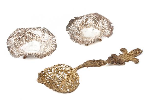 Appraisal: A silver-gilt bon bon spoon and pair silver candy dishesTiffany