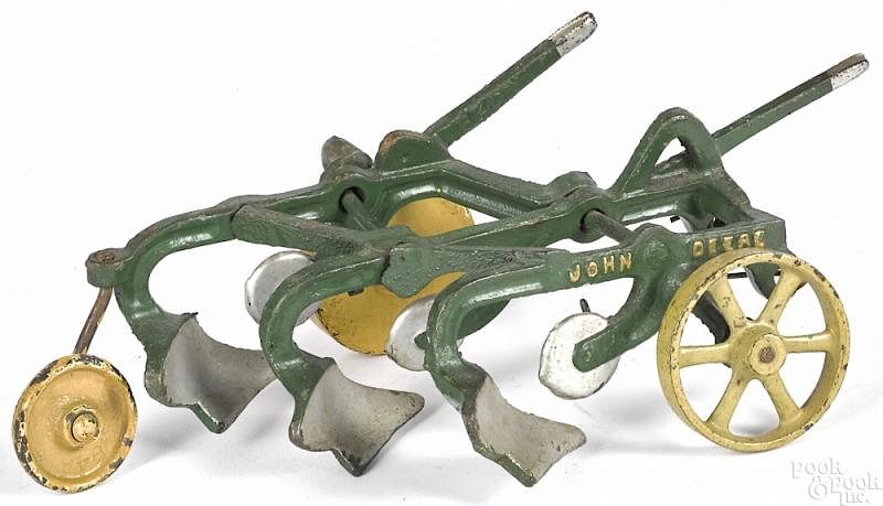 Appraisal: Vindex cast iron three-bottom John Deere plow Vindex cast iron