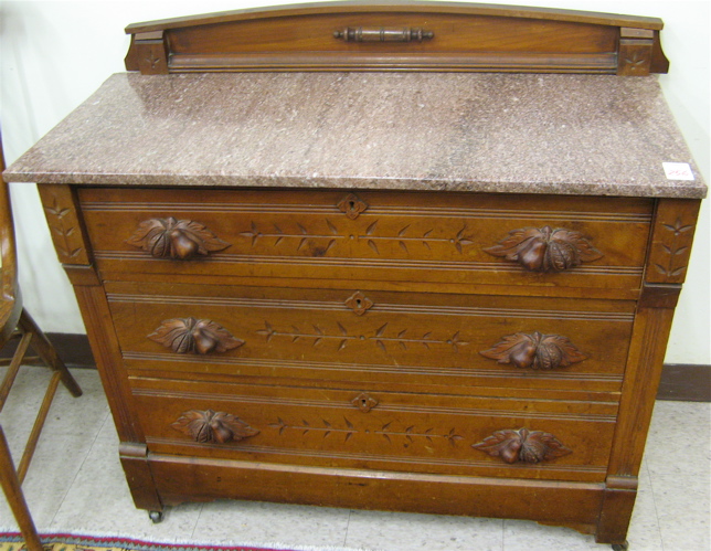 Appraisal: A VICTORIAN LOW CHEST OF DRAWERS Eastlake design American c