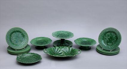 Appraisal: GROUP OF SIXTEEN GREEN-GLAZED POTTERY TEA ARTICLES Comprising a in