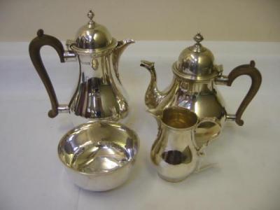 Appraisal: A FOUR PIECE TEA SET of baluster form the domed