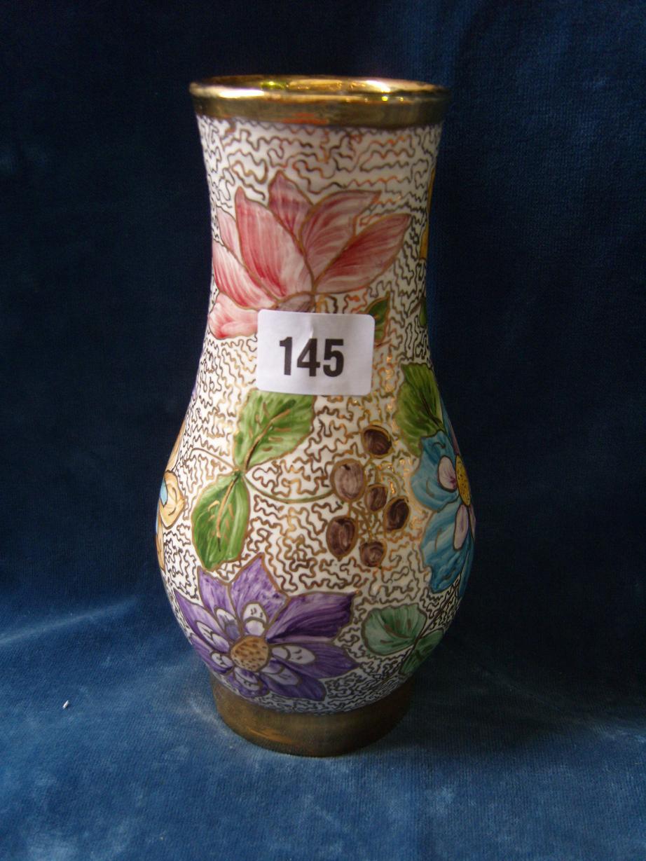 Appraisal: A cream ground vase with painted all-over gilt wriggle work