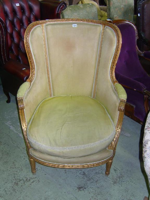 Appraisal: A continental salon armchair with scrolled arms square taper supports