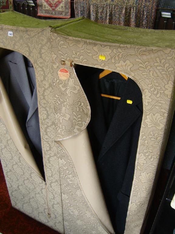 Appraisal: Two Jekmoth moth proof fabric safety wardrobes containing a collection