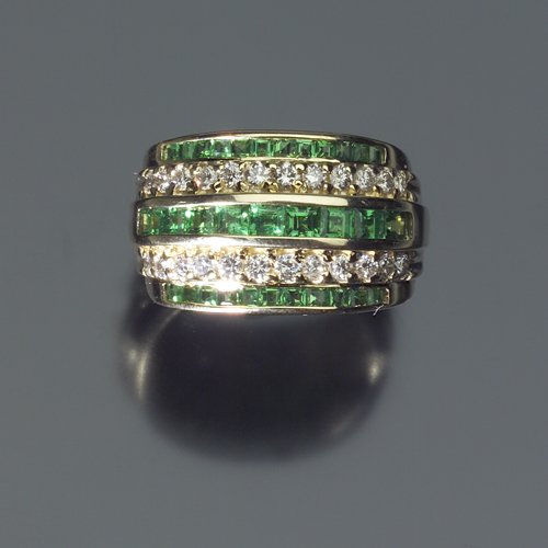 Appraisal: Diamond and tsavorite band k yellow gold Channels of calibre