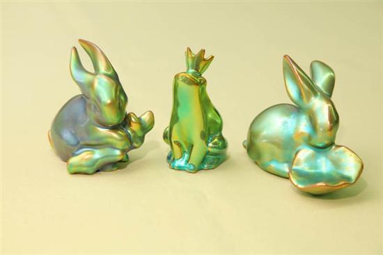 Appraisal: THREE ZSOLNAY ANIMALS All iridescent green A frog with a