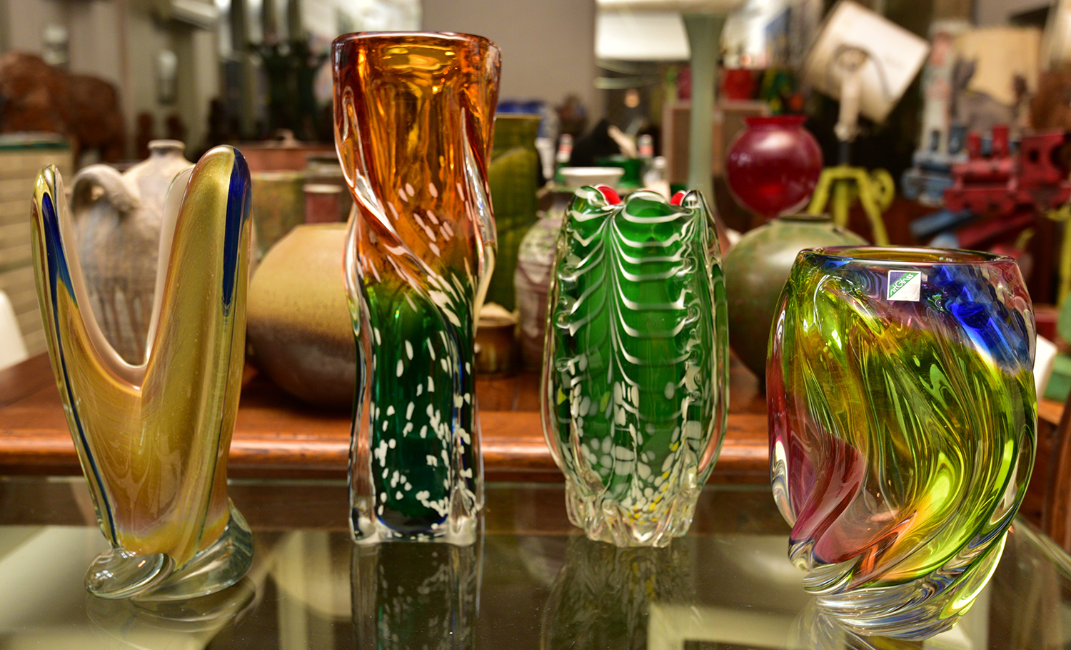 Appraisal: FOUR ARTGLASS VASES ONE FROSTED h x diameter