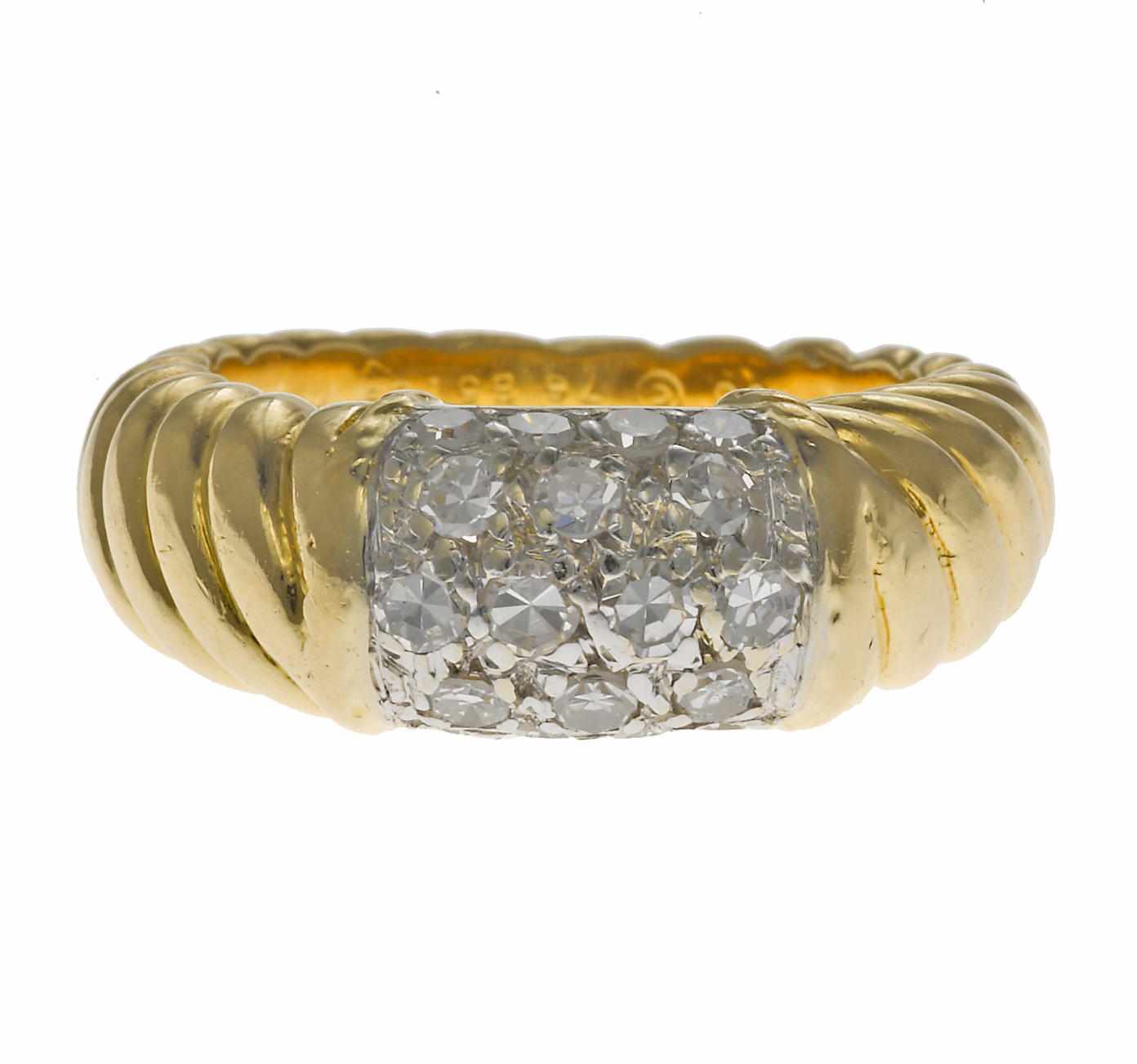 Appraisal: A diamond and eighteen karat bicolor gold ring Van Cleef