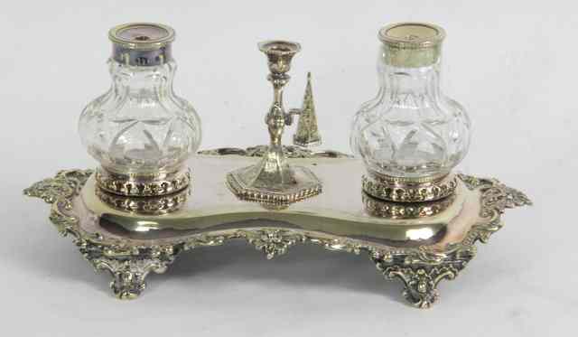 Appraisal: An Edwardian pen tray with pierced and decorated border fitted