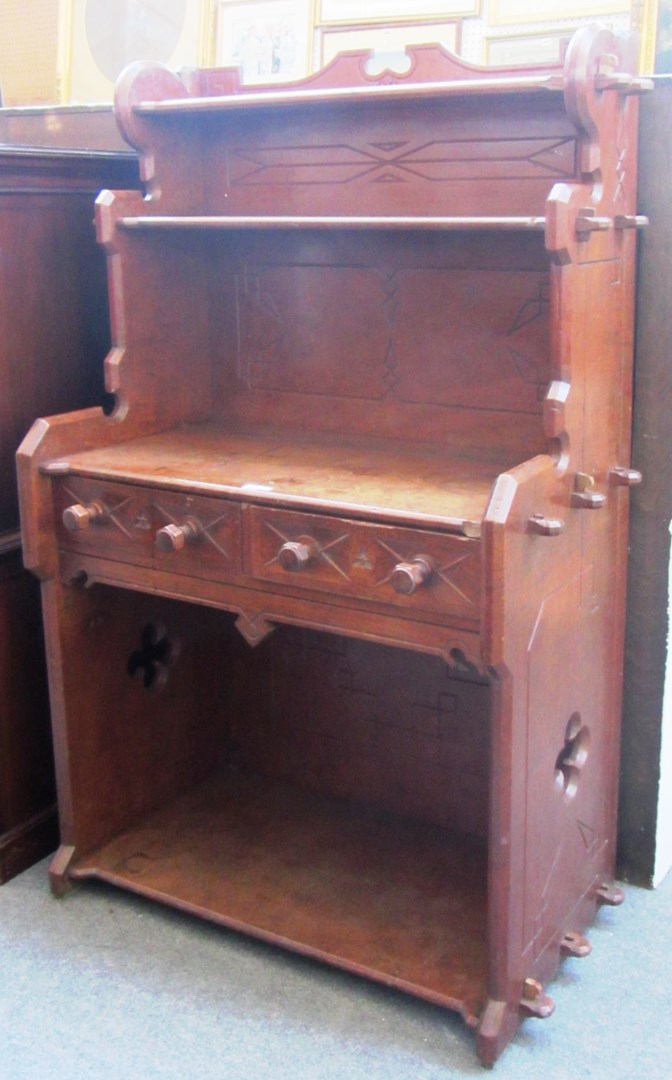 Appraisal: A Victorian oak Gothic Revival dresser with pair of frieze