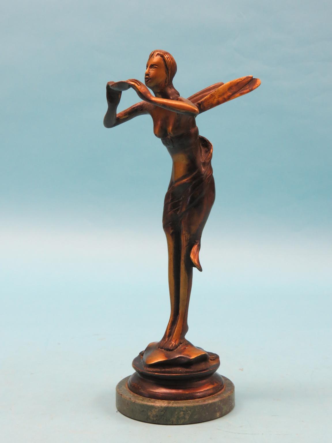 Appraisal: An Art Deco-style bronze statuette winged female on circular green