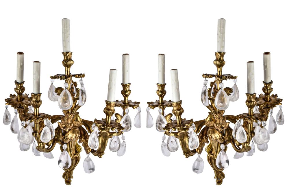 Appraisal: PAIR OF FIVE-LIGHT GILT BRONZE SCONCESwith rock crystal drops wired