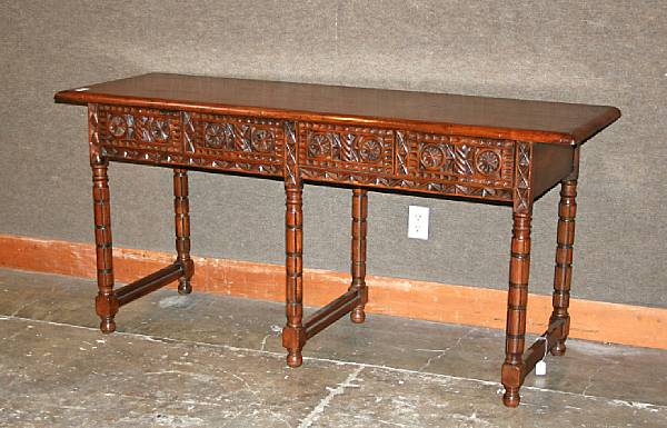 Appraisal: A Spanish Baroque style walnut side table th century