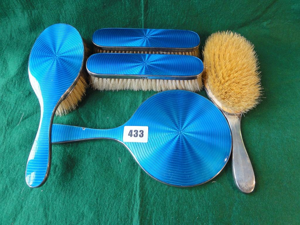 Appraisal: A silver dressing table brush and mirror set with blue