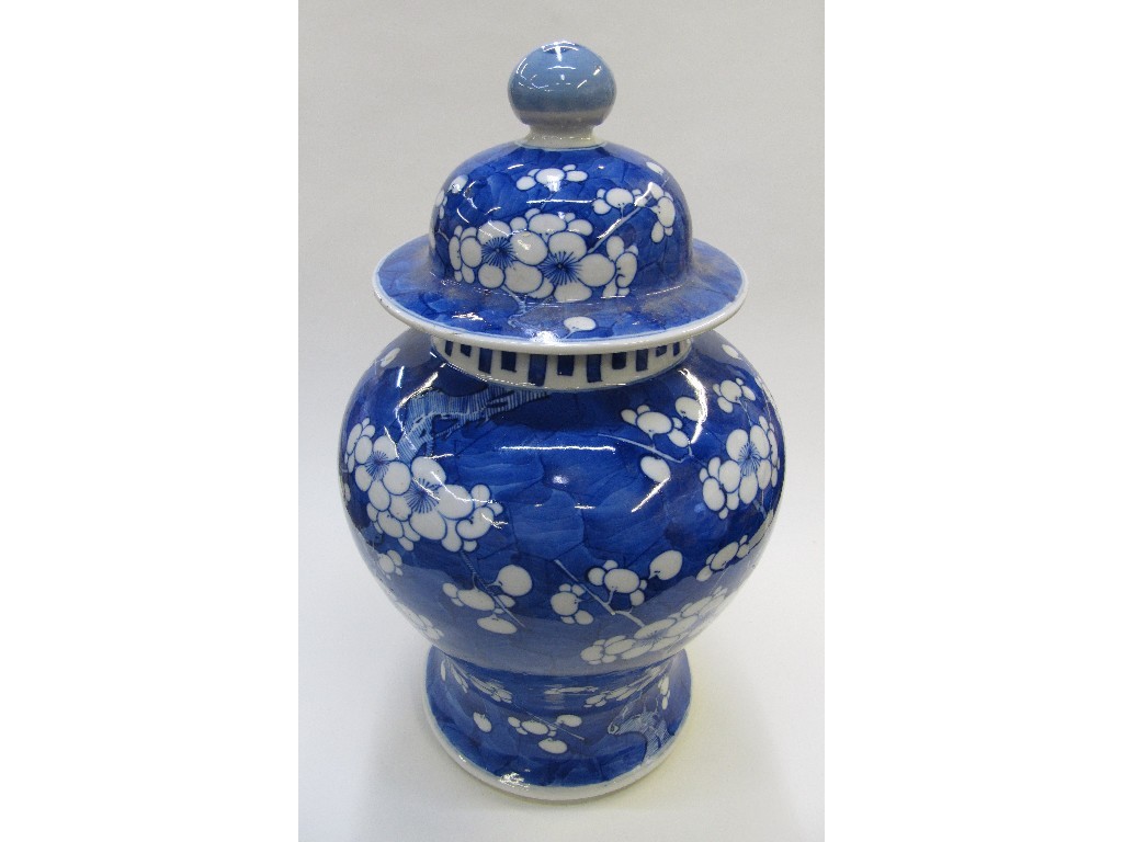 Appraisal: Large blue and white jar and cover decorated with prunus