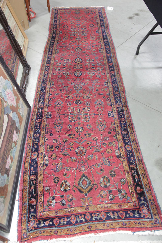 Appraisal: ORIENTAL STYLE RUNNER Pink ground with multiple borders and floral