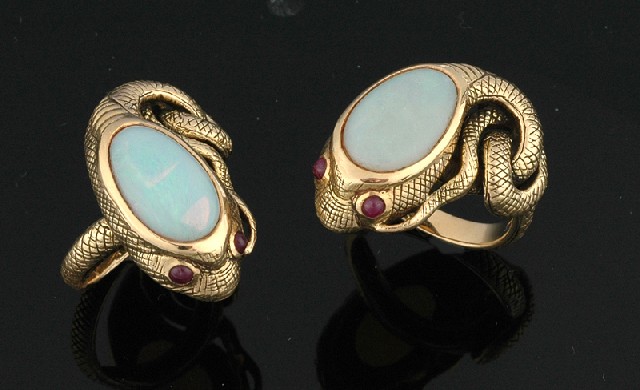 Appraisal: A PAIR OF GOLD AND OPAL SERPENT RINGS The ct