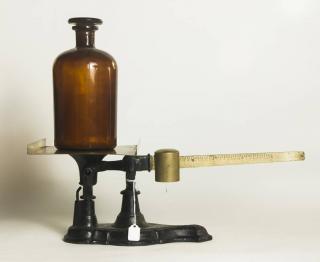 Appraisal: Iron and Brass Scale together with Amber Pharmacy Bottle Scale