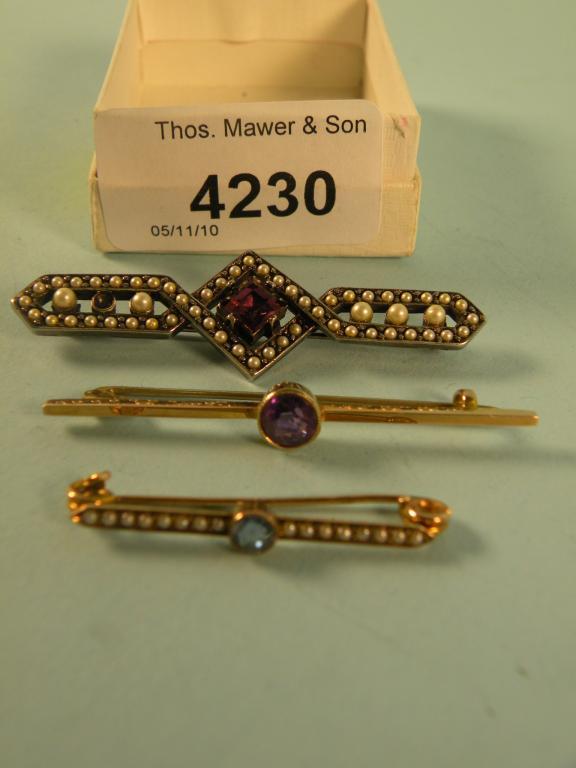 Appraisal: A carat gold and amethyst bar brooch another bar brooch