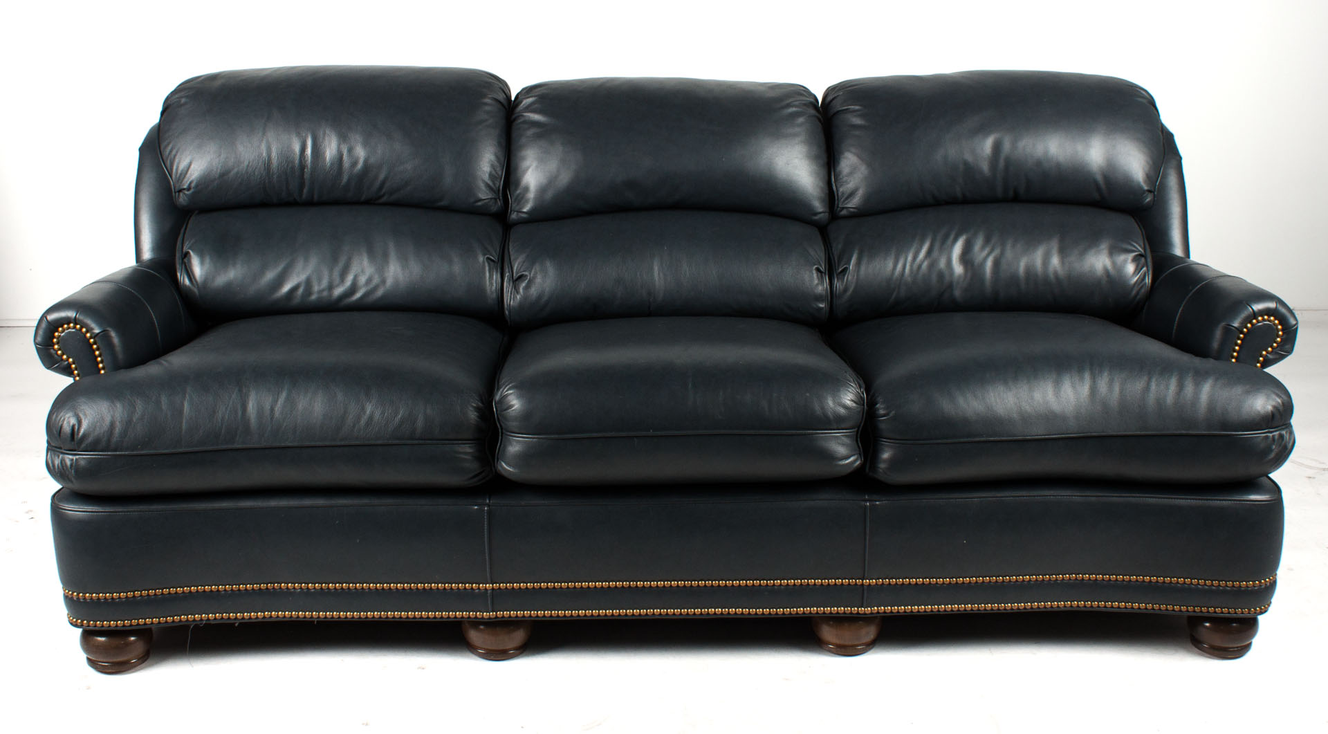 Appraisal: Hancock Moore leather upholstered sofa dark blue leather brass tack