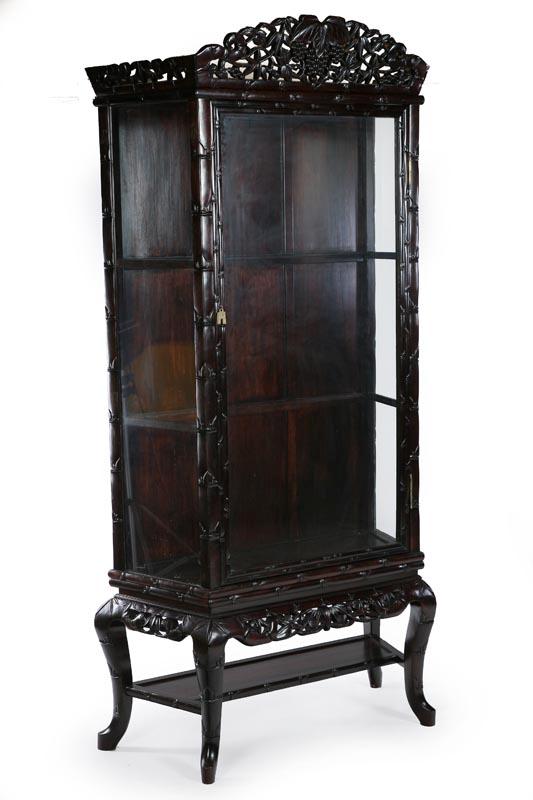 Appraisal: CURIO CABINET Asian st half- th century mahogany Two-piece canted