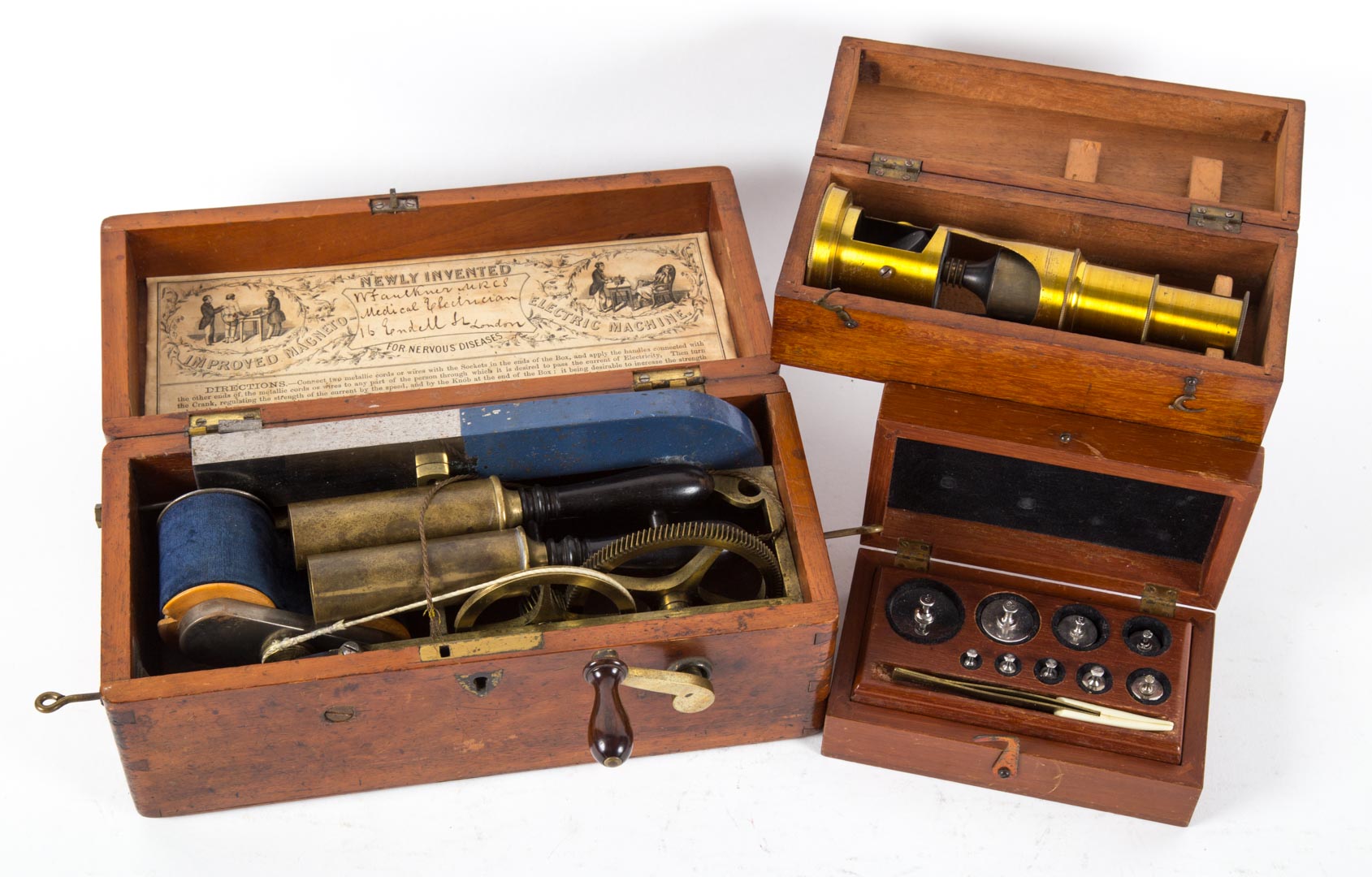 Appraisal: Three th century scientific instruments including Improved Magneto Electric Machine