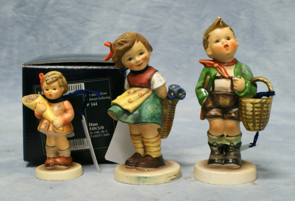 Appraisal: Goebel Hummel figurines Bashful Hum A Sweet Offering Hum with