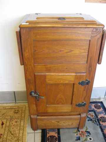 Appraisal: Victorian Oak Ice Box lift top cooler withdoor below and