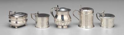 Appraisal: Five English silver mustard pots all with blue glass liners