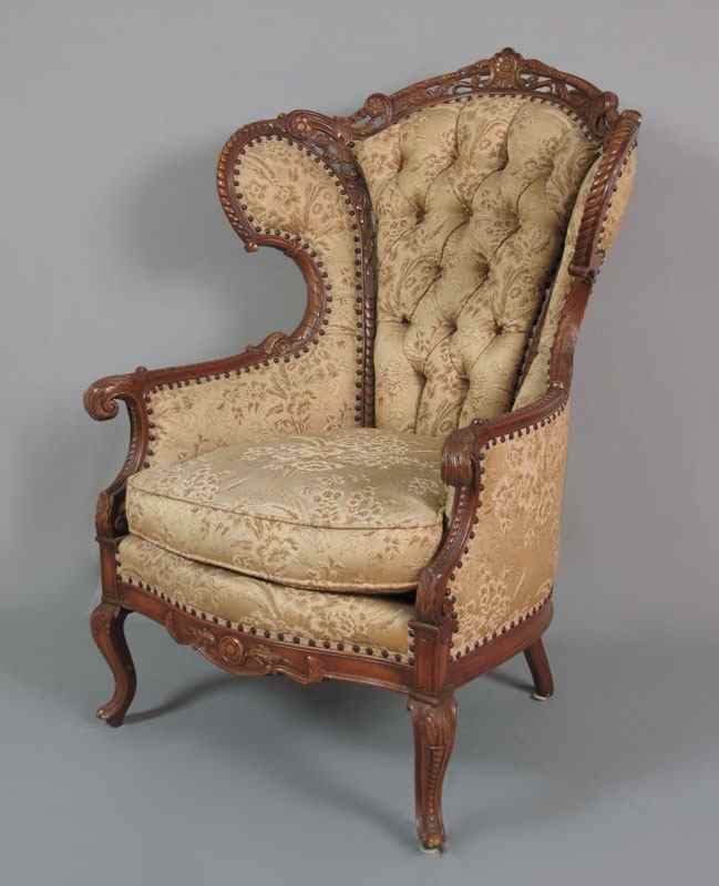 Appraisal: FRENCH STYLE CARVED PARLOR CHAIR Elaborately carved and shaped with