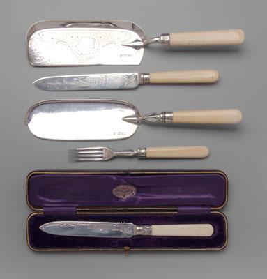 Appraisal: English silver serving pieces oval bone handles English silver blades