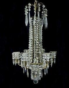 Appraisal: A Regency chandelier fitted six metal candle brackets with cut