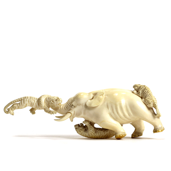 Appraisal: Antique Chinese carved Ivory elephant fighting tigers figure group L