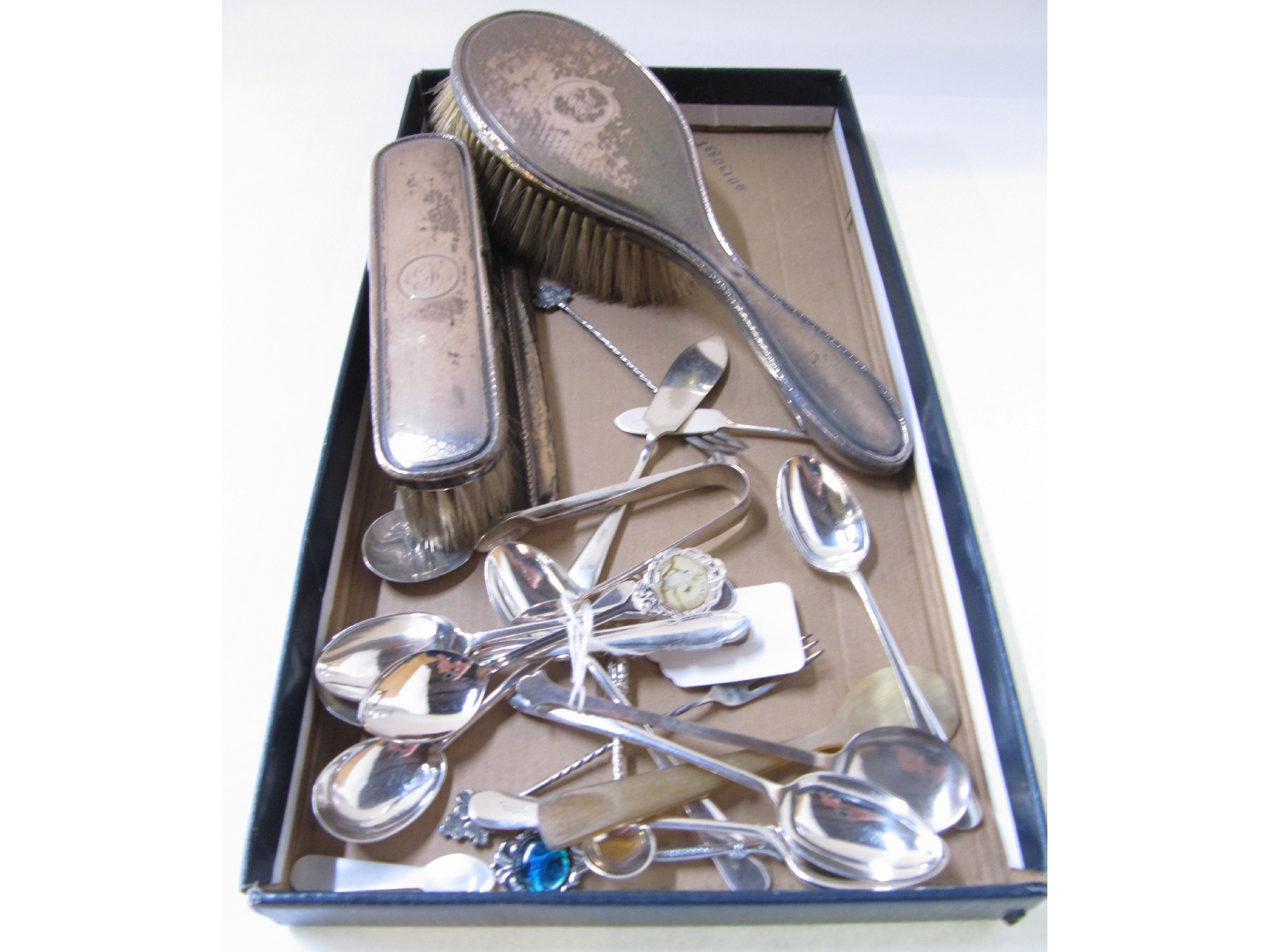 Appraisal: A lot comprising two silver backed brushes and assorted silver