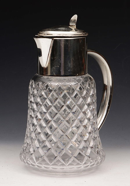 Appraisal: A LARGE CUT GLASS CORDIAL JUG with silver plated mounts