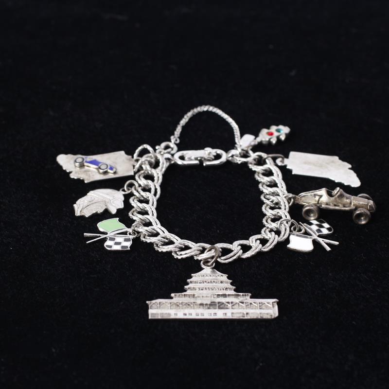 Appraisal: Sterling Silver Indy Charm Bracelet Manufactured by Monet Charms jeweled