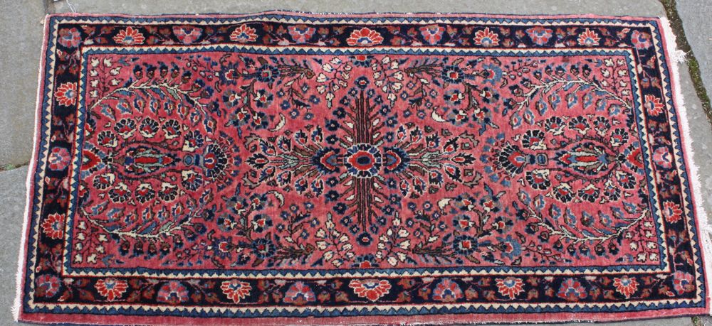 Appraisal: ORIENTAL RUG SAROUK ' x ' Red field with traditional