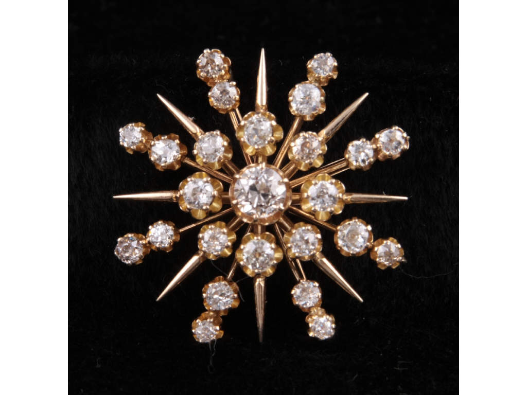 Appraisal: Victorian Diamond Brooch K K yellow gold snowflake diamond brooch