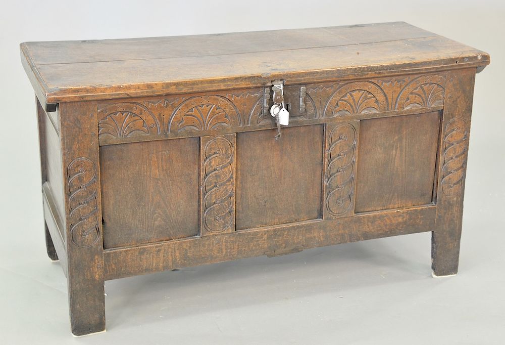 Appraisal: George III oak three panel lift top chest ht in