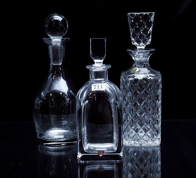 Appraisal: An Orrefors decanter together with two other decanters