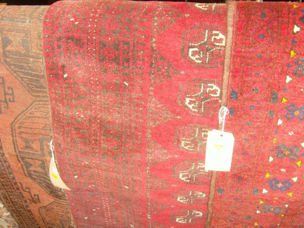 Appraisal: A collection of five various red ground eastern wool rugs