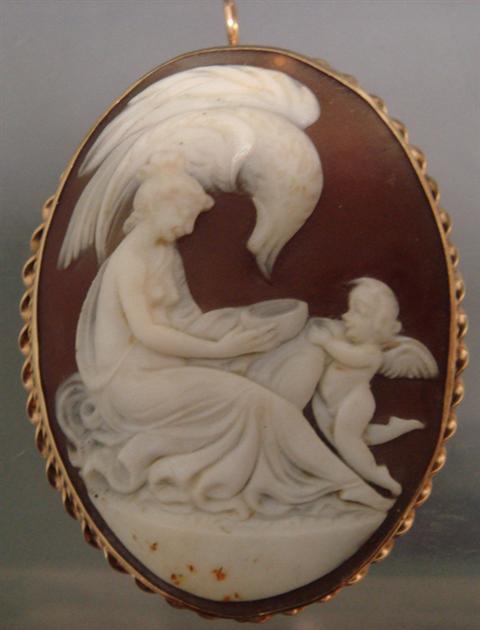 Appraisal: K YG carved shell cameo pin nude woman with cherub