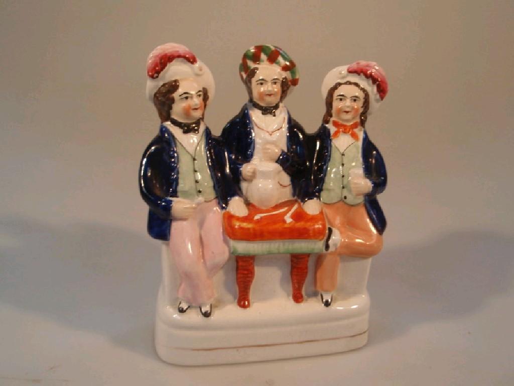 Appraisal: A Victorian Staffordshire flat back figure group of three gentlemen