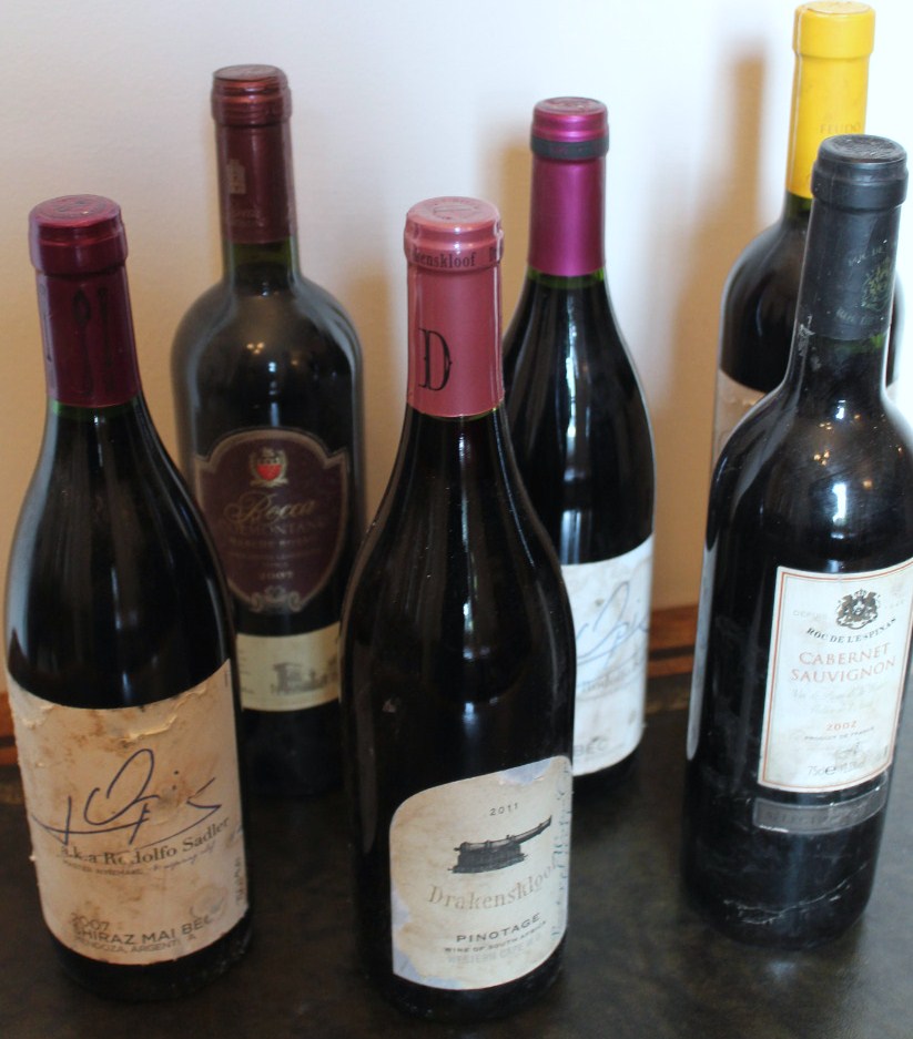 Appraisal: Six bottles of red wine including Roc de L'Espinas Cabernet