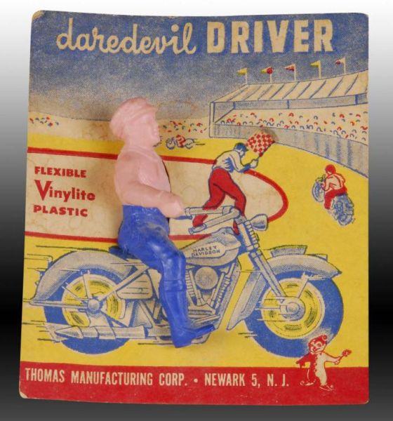 Appraisal: Classic Harley Davidson Motorcycle Toy with Rider Description This toy