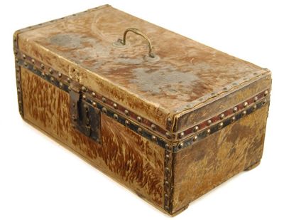 Appraisal: A th century hide covered and brass studded small trunk