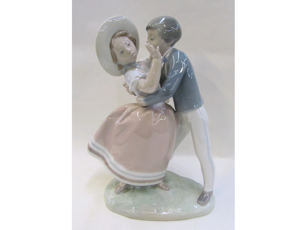 Appraisal: Lladro figure group of a young couple embracing