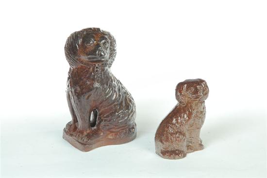 Appraisal: TWO SEWERTILE SEATED DOGS American early th century Molded with